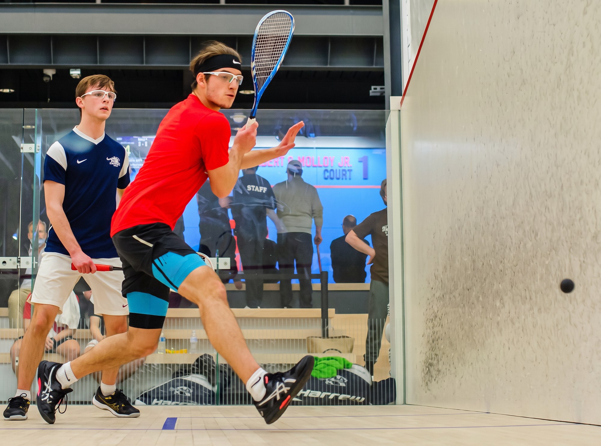 Sebastian De La Vega playing squash